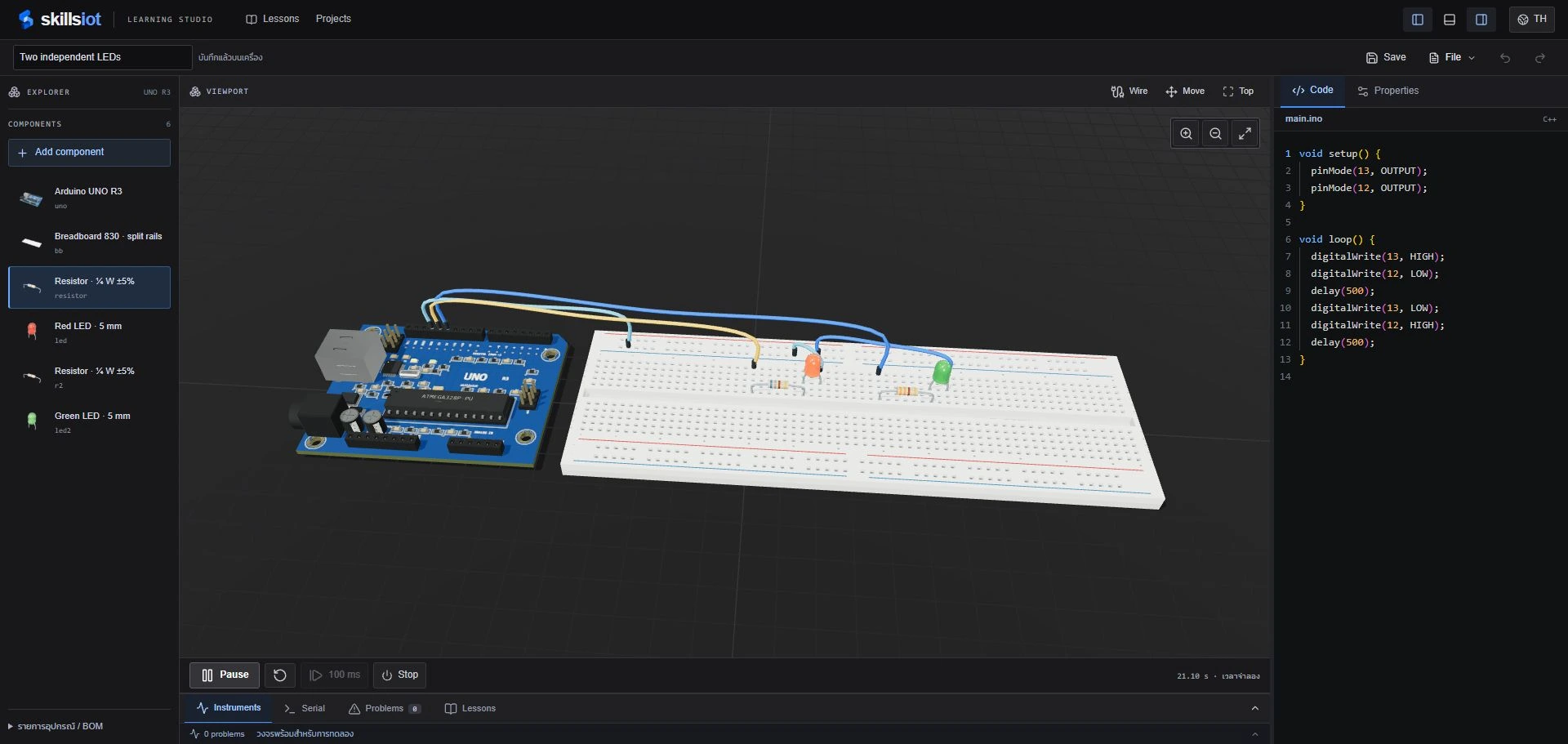 ภาพหน้าจอ Learning Studio ของ skillsiot แสดงวงจร LED สองดวงและโค้ด